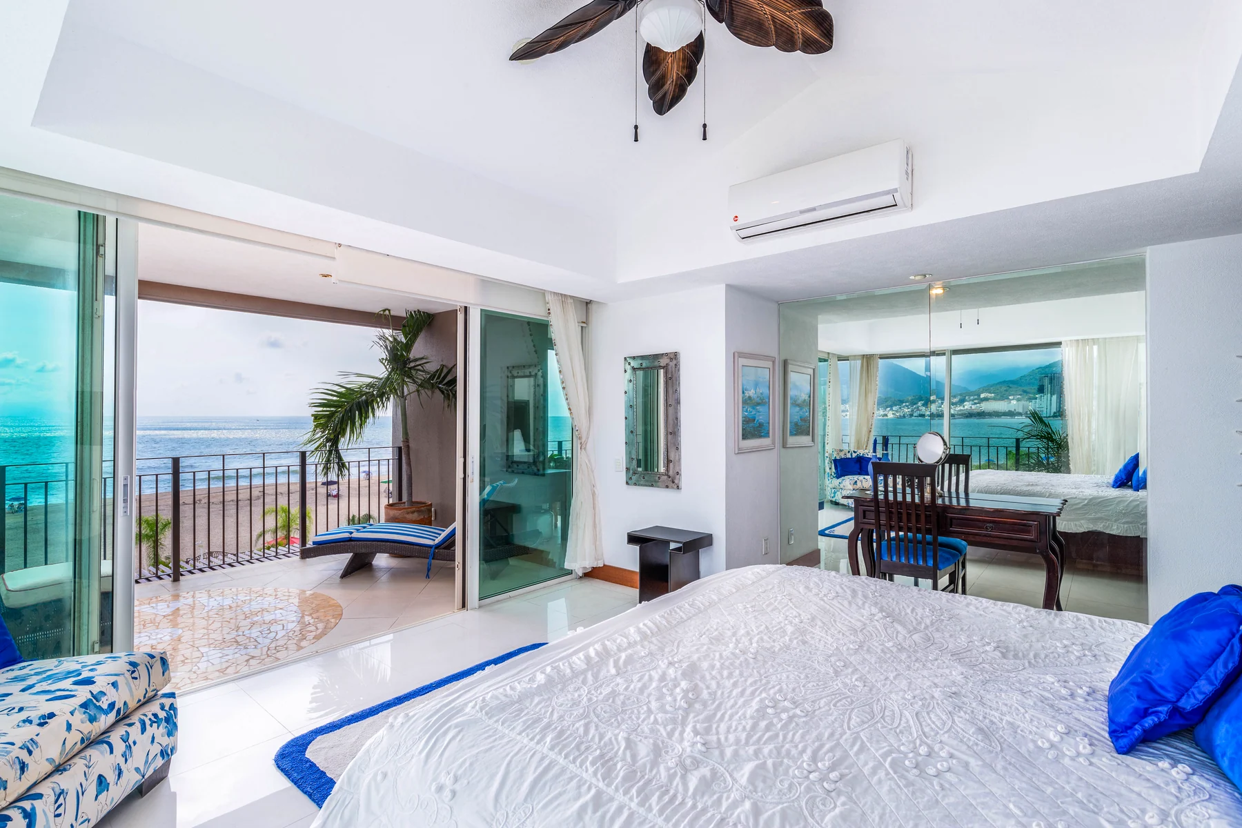 Primary bedroom, with the terrace and the bay ahead
